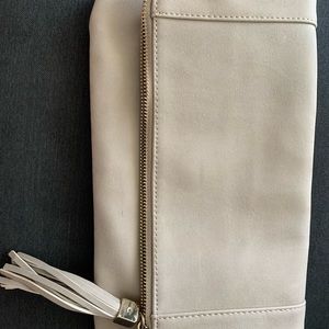 fold over clutch tassel zipper closure